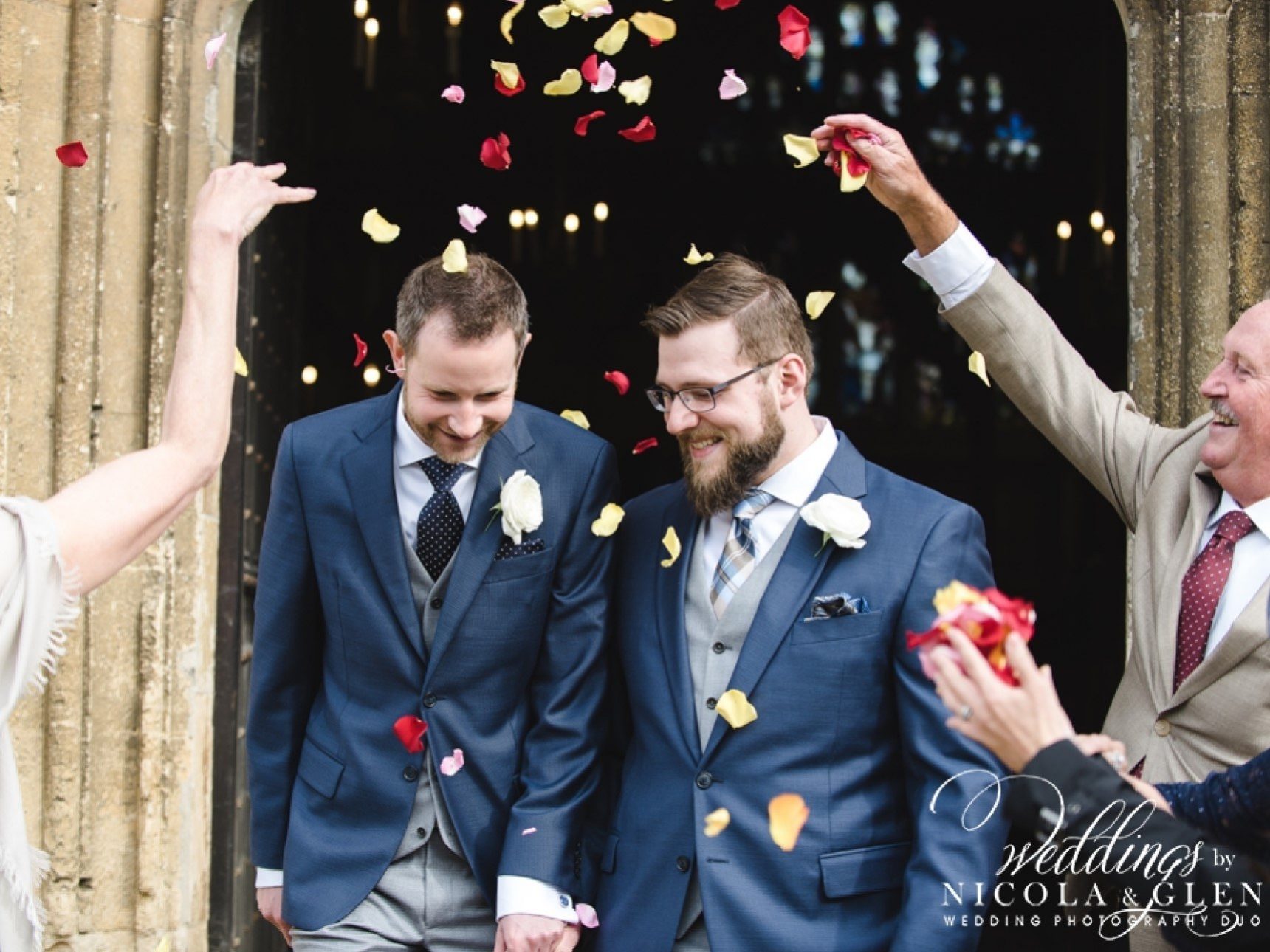 Groomsmen with confetti outside church door