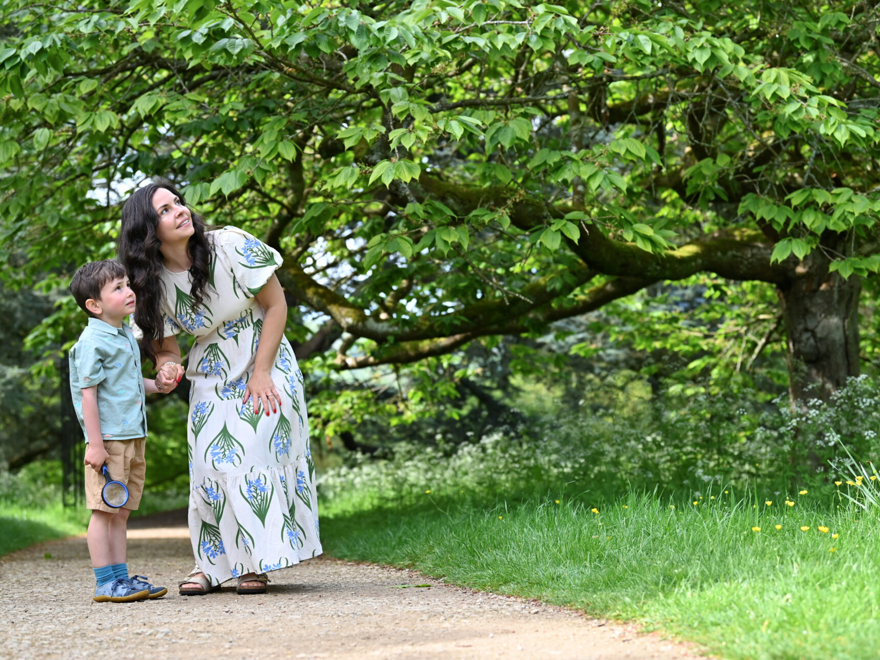 Mother and son enjoying Sudeley Castle's trees