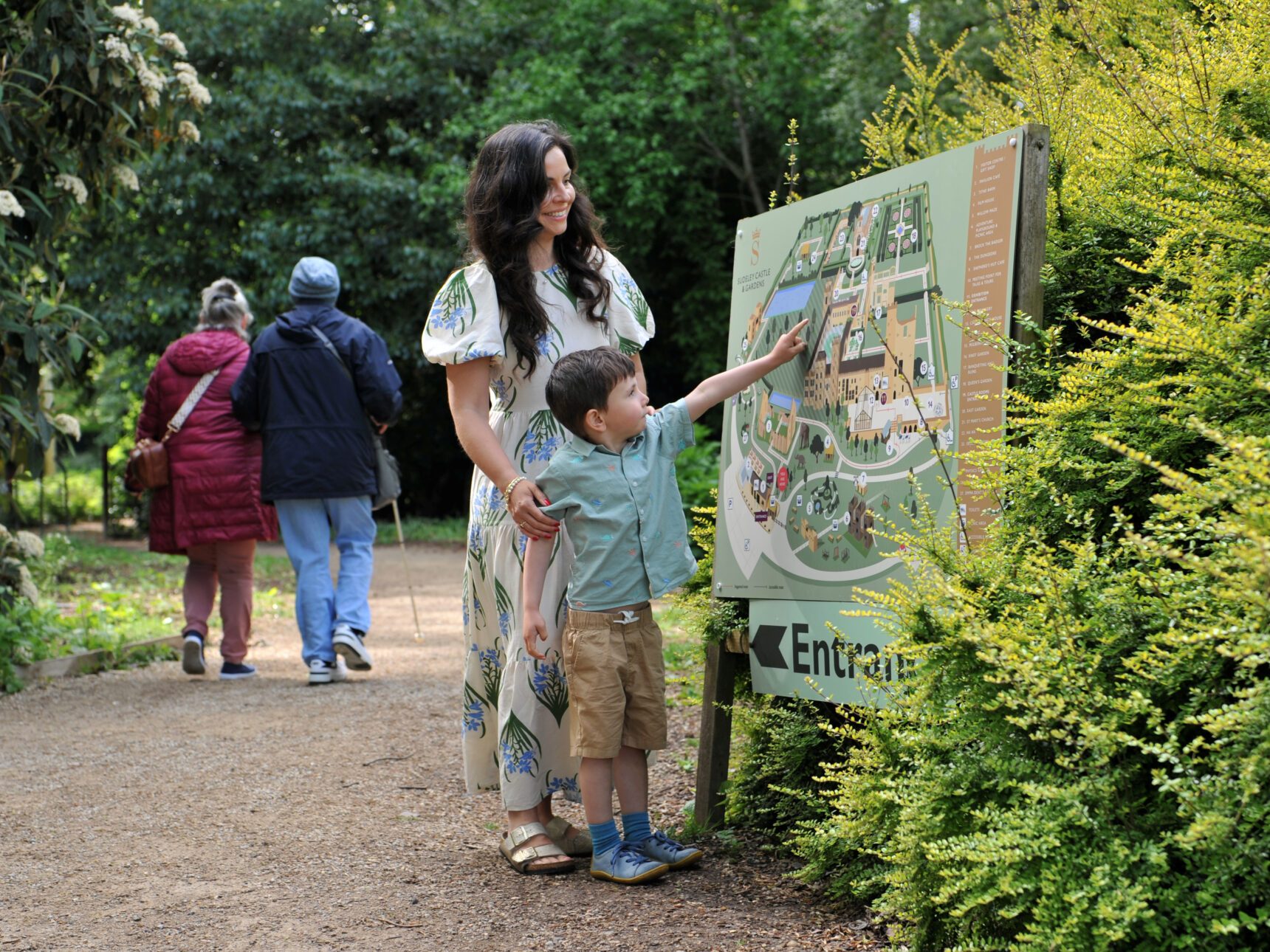 Mother and son checking Sudeley Castle's site map